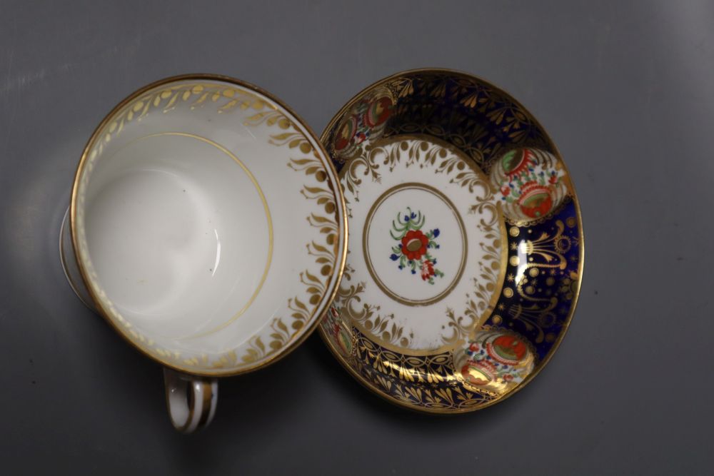 A Chamberlain Worcester cup and saucer in an imari style and a small cup and saucer in the same pattern, 15.5cm